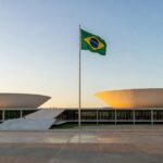 Congresso Nacional em Brasília com bandeira do Brasil, simbolizando apoio político para deputado federal